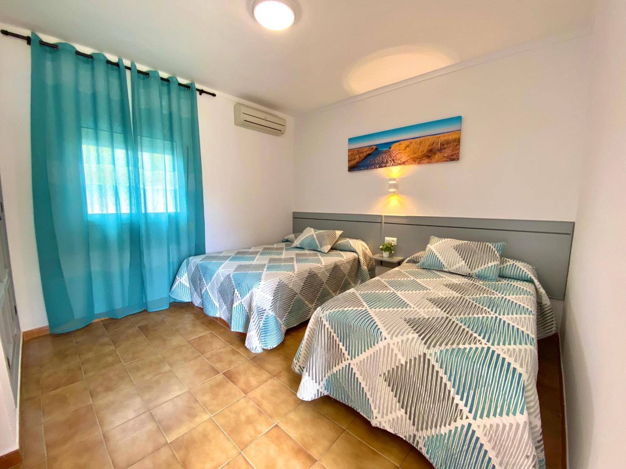 Hostal Los Mellizos Conil De La Frontera Exterior photo A bedroom in a hotel in Spain